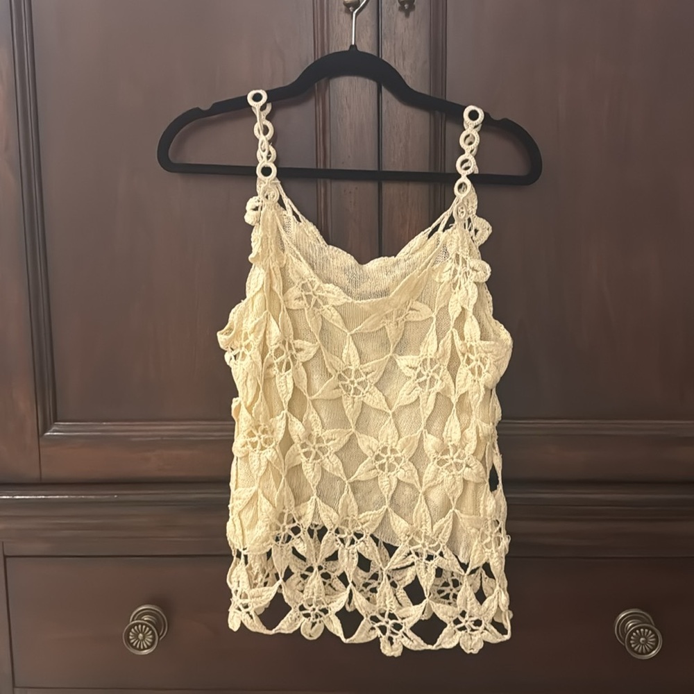 Lined crocheted top purchased in Italy. I have never worn this shirt.